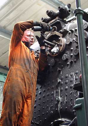 Kevin Blake cleans up the regulator stuffing box. May 16 2004