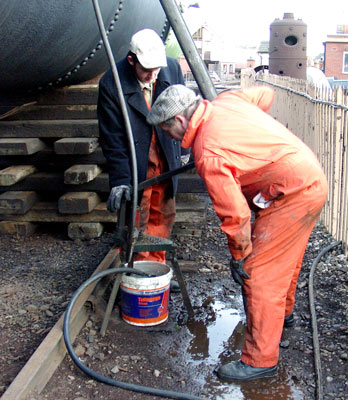 The hydraulic pressure was pumped up manually, not an easy task. A substantial amount of the hard work was carried out by Leon Salter (left) and John Salter. March 06 2004