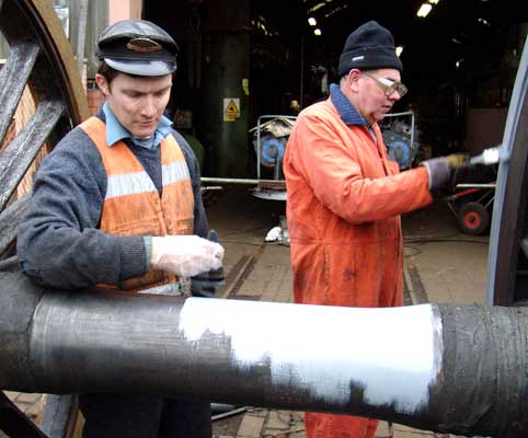 Your webmaster and Keith Clarke painting the rear wheelset. March 27 2004