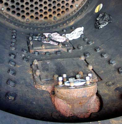 Most of the bolts attaching the smokebox to the smokebox saddle have been re-fitted. Only a few at the front remain to be done. May 16 2004