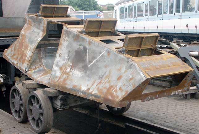 The ashpan rebuild and modification is proceeding well. The new hopper doors are in position. The V in the side indicates the location of the triangular section inside the ashpan to direct ash towards the doors. July 19 2003