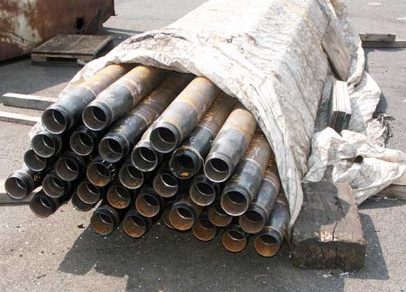 These are all the new flue tubes with the bottle ends welded on. This end of the tube screws in to the firebox tubeplate. August 16 2003