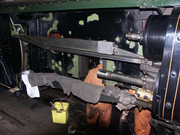 Proof the crank axle is out of the frames ! Just visible are parts of Tyseley's wheel drop. Note also the piston rod and the rags protecting the slide bar surface. March 23 2003. &copy; Martyn Bane