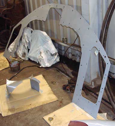 Towards the end of the day one side of the spectacle plate was primed. In front of it are the two exhaust passage covers. November 9 2003