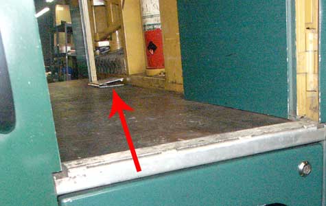 The locomotives are single manned. For safety they are fitted with a vigilance device, in this case a deadman's pedal. The pedal used when run backwards is shown here by the red arrow. October 8 2003