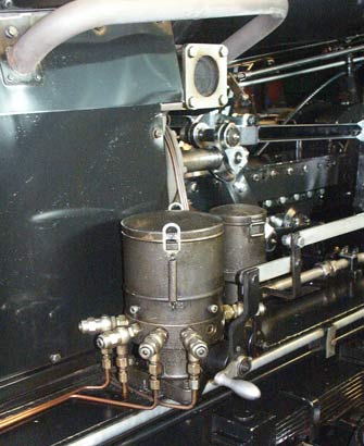 This item is the mechanical lubricator. The drive from the motion can be seen coming in from the right. October 8 2003