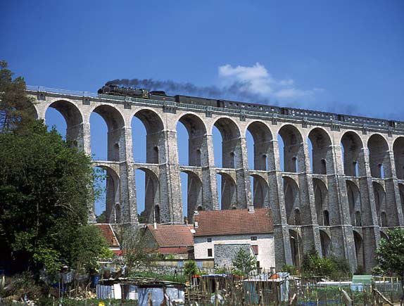 231G558 slowly crosses the 50 arch Chaumont Viaduct with the Paris bound 'Alsace Lorraine Express'. June 1 2003