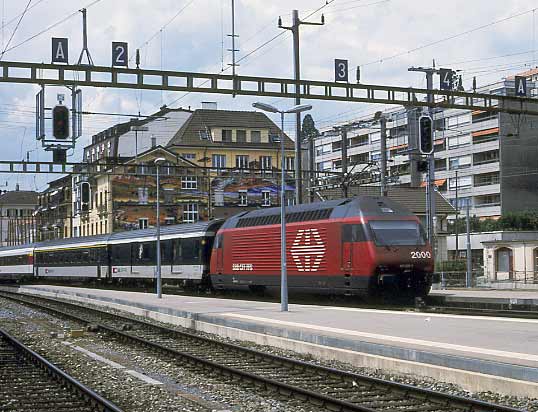 The Class 460 electrics have very much become standard motive power in Switzerland. Here an SBB 460 arrives from the west at Neuchâtel. May 31 2003