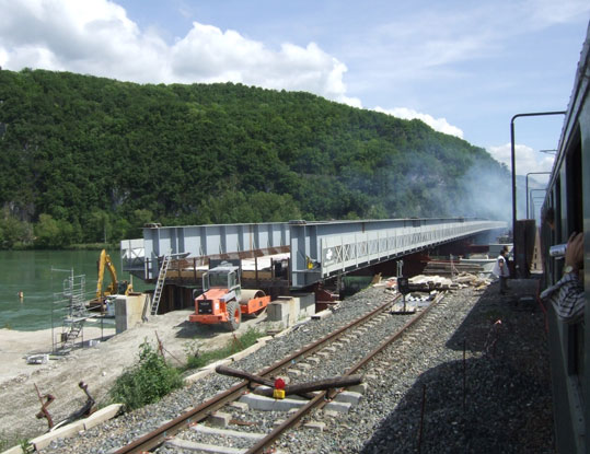 Not surprisingly the approach to Culoz was heralded by a considerable slowing for the single line working section. We got an excellent view of the bridge replacement work. The river is, again, the Rh&ocirc;ne.