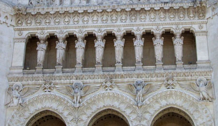 Basilica Notre-Dame de Fourvi&egrave;re is ornate on the outside and totally over the top on the inside. &copy; Brian Bane