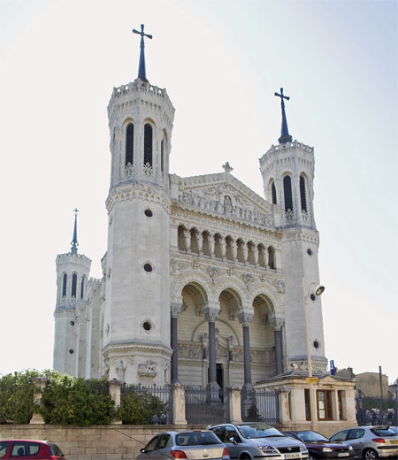 Basilica Notre-Dame de Fourvi&egrave;re is ornate on the outside and totally over the top on the inside. &copy; Brian Bane