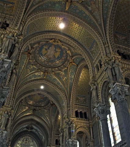 The inside of the Basilica Notre-Dame de Fourvi&egrave;re is rather over the top and gaudy. No such thing as restraint here! &copy; Brian Bane 