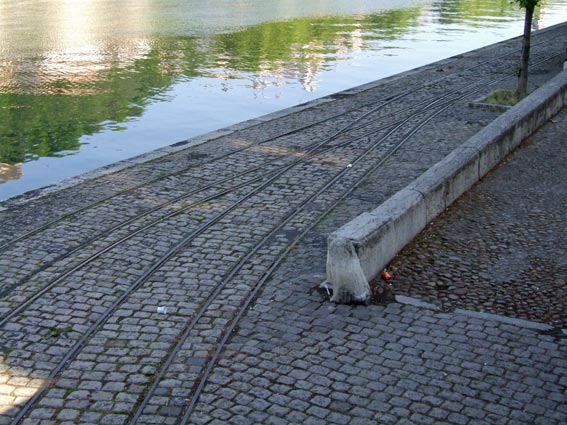 Alongside the Sa&ocirc;ne were signs of the old tram network which at this point was dual gauge.