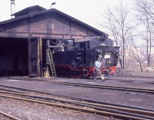 At Radeburg the sun came out ! VIK 99 713 takes water at the depot. April 7 1996