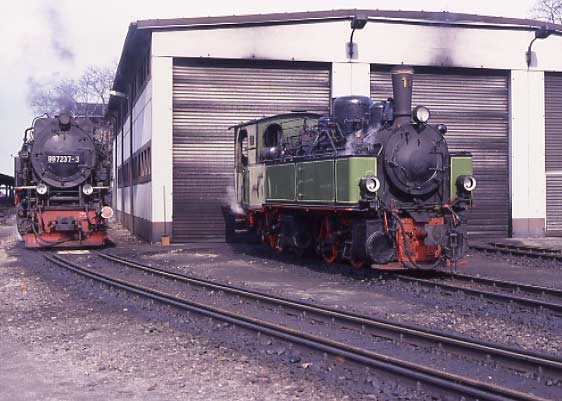 Mallet 0-4-4-0t 11 and 2-10-2 99 7237-3 at Wernigerode locomotive depot. April 12 1996