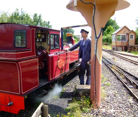 The engineer behind the radical improvements to 'Mark Timothy', Ian Gaylor, is seen here topping up the loco's tanks. 28 June 2006