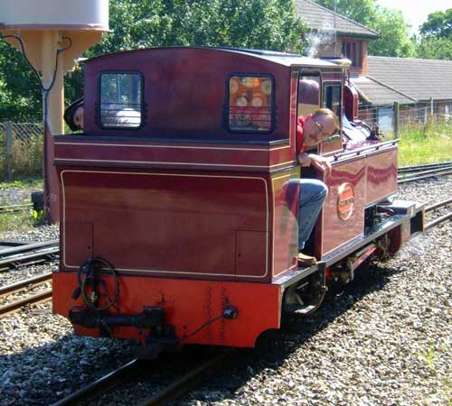 Leek and Manifold Railway look-a-like 'Mark Timothy' backs down towards Aylsham station. 28 June 2006