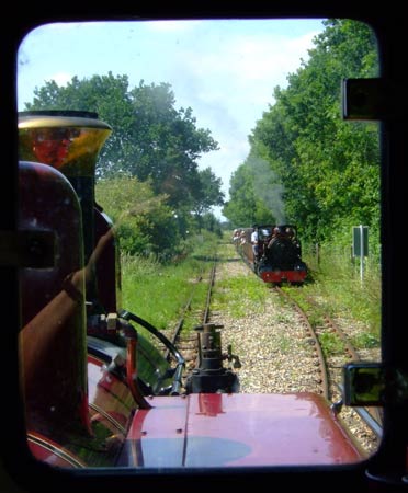 One modified loco from the other - No.6 waits for 'Mark Timothy' to cross with an Alysham bound train. June 28 2006