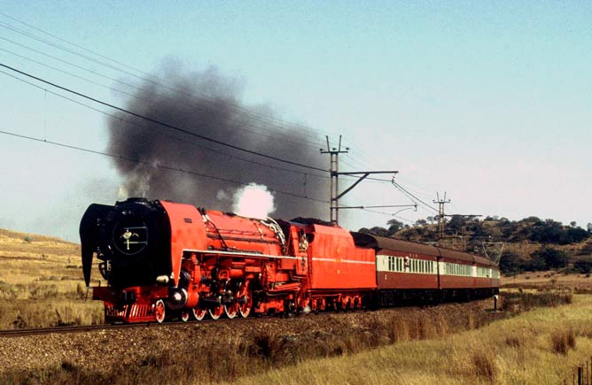 On the single track near Goedvertrouwd 3450, unusually, makes smoke whilst on a passenger service. June 11 1983.  Roger Griffiths 