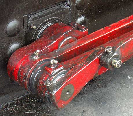 A close up of the big end, coupling rod and return crank on one of the bogies. The bearings with grease nipples are rollers. April 11 2004 