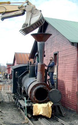 The new mixing chamber and diffuser, with traditional chimney top, is lowered in to postion on No.9. October 21 2003. Courtesy of Nigel Day
