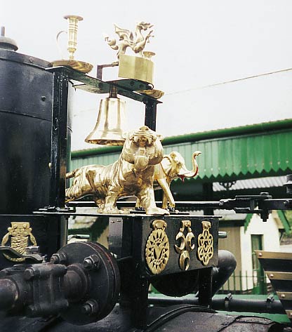 A Welsh tiger and an Indian elephant ride above the injector pipework along with several other brass items.© Nigel A. H. Day