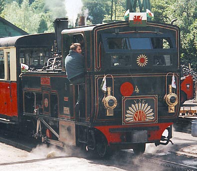 Looking magnifigant in 2000. No.4 Snowdon is seen at Llanberis with Nigel in the firemans seat. Courtesy of Nigel A. H. Day