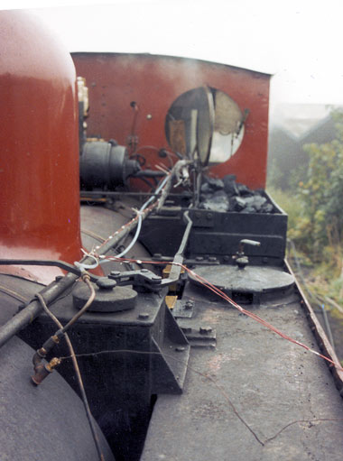 WLLR No.14 during testing. Note the additional pipe work and cables installed for the tests. Test showed a 16% haulage increase in haulage capacity and a 10% reduction in fuel used. As originally draughted No.14 would not steam if a spark arrestor was used ! &copy; Nigel A. H. Day 