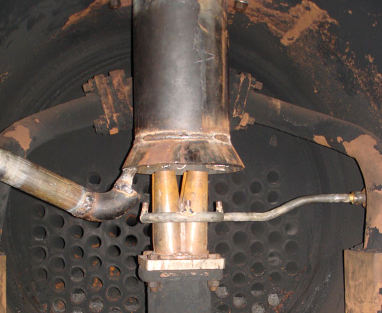 A view of the Lempor nozzle, improved blower, bell mouth and mixing chamber on No.19. On the left is the vacuum ejector exhaust. As on other WLLR locos this is exhausted via the chimney, not the optimum arrangement as it interferes with gas mixing in the ejector and thus affects performance. Note that the locomotive is a saturated machine, a limiting factor on ejector performance. 17 December 2007. &copy; N.A.H. Day 