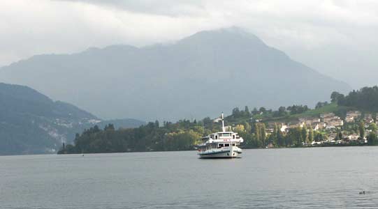 The ferry for Lucerne approaches the jetty at Lido. Sadly this ferry is diesel powered. October 4 2003