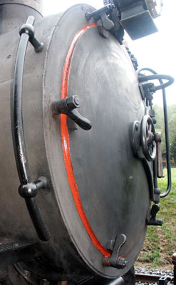 A red sealant is used on 1067 to help keep the smokebox door air tight. October 5 2003