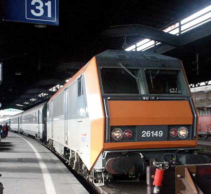 SNCF 'Sybic' 26149 at platform 31 Basel SNCF station. The coaches are being released by a shunting locomotive to allow the loco to be released from the dead end road. October 8 2003
