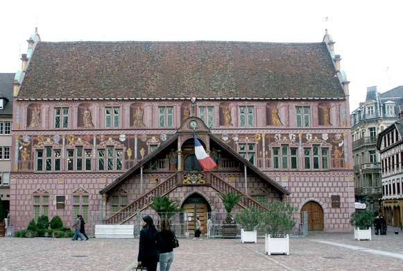 One building very much painted to give the impression of using nice stone work is the Hotel de Ville. October 8 2003