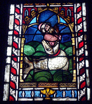 A close up of one section of stained glass depicting Jonah. October 8 2003