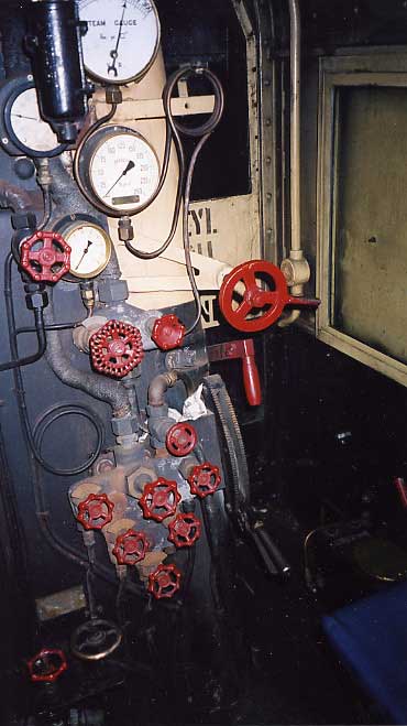 The fireman's side of the cab showing the revised water gauge arrangement. Certain stoker controls have been arranged for the oil firing whilst the oil feed valve control is to the right of what were stoker jet controls. September 2001.