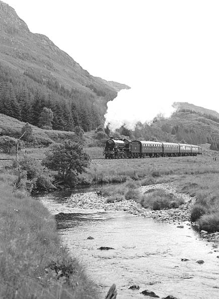 LNER B1 4-6-0 61264 climbs away from Glenfinnan with 'The Jacobite'. July 9 2003