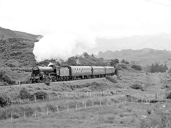 One more shot before Mallaig, this time at Morar. 62164 climbs away from the station towards the next summit on the line. July 8 2003