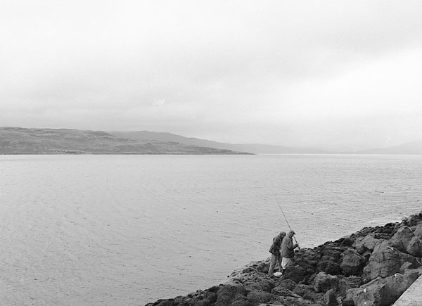 Locals fishing for a meal in Loch Na Keal. July 6 2003