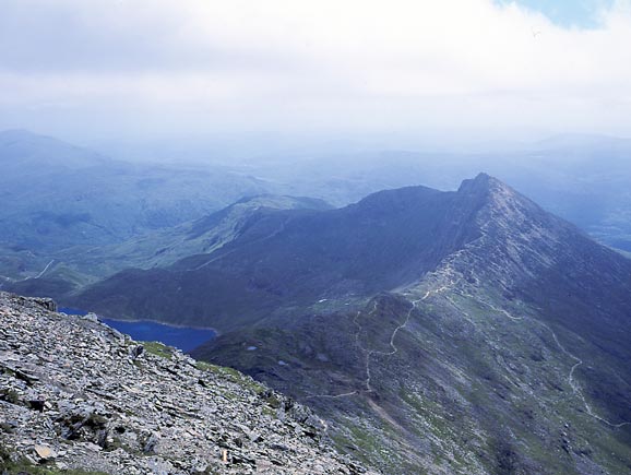 The view from the summit of Snowdon looking south out over Bwlch Main towards the summit of Yr Aran and beyond. July 12 2003