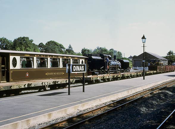 NG143 prepares to set the stock back in to the carriage shed at Dinas. July 12 2003
