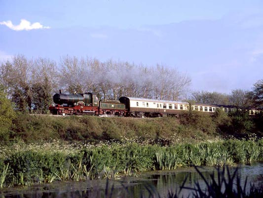 3440 City of Truro approaches Burlescombe on the climb to Whiteball tunnel. May 10 2004