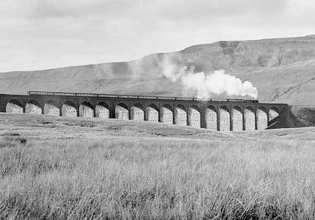 45157 (45407) heads across Ribblehead viaduct. October 2000