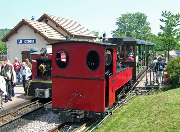 Les Combes station is the destination on the Chemin de Fer du Creusot. Here the Henschel 0-8-0t stands with its train alongside one of the diesels. The steam loco had been turned at Les Combes for the downhill run.