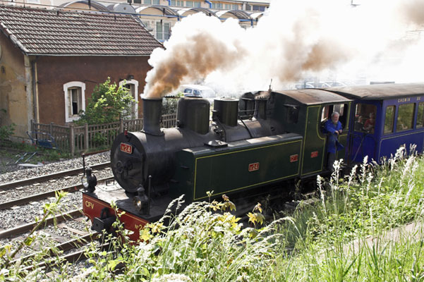 CFV 0-8-0t No.24 sets off from Tournon with the 10am service to Lamastre. The locomotive is about to cross on to the section to track shared with the SNCF standard gauge route. &copy; Brian Bane