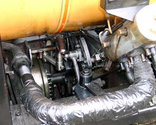 A view from the other side to the V engine. The locomotive is equipped with Stephenson Valvegear. Also visible is the live steam pipe feeding the cylinder. April 12 2004