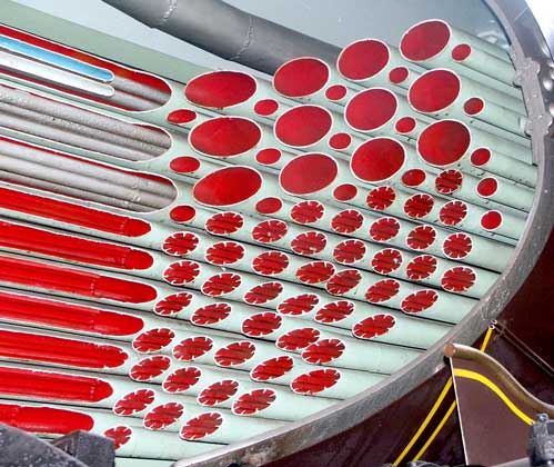 A very common feature on French locomotives was the use of Serve tubes. These are the small tubes with the fins. They are like this to provide a greater surface area and thus increase heat transfer to the water in the boiler. October 9 2003