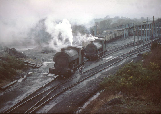 No.2114 sits in front of No.1426 at Brynlliw Colliery. January 31 1978. © Roger Griffiths No.2114 sits in front of No.1426 at Brynlliw Colliery. January 31 1978. © Roger Griffiths
