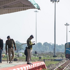 DSC3888  As station security waits for something to attend to NDM6 No.605 of the Darjeeling Himalayan Railway takes fuel at New Jalpiguri prior to hauling the daily train up to Darjeeling. : India