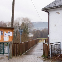 DSC7318  The railway through Steinbach onward to Wolkenstein used to run where the wooden footbridge now stands. The buffer stops are now as far north as the line runs. : Germany